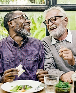 retired friends at restaurant for seminar about annuities for retirement